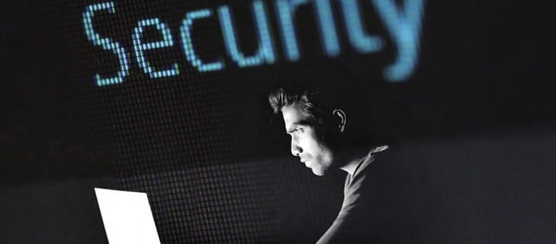 image_hacker_in_front_of_computer_with_the_word_security